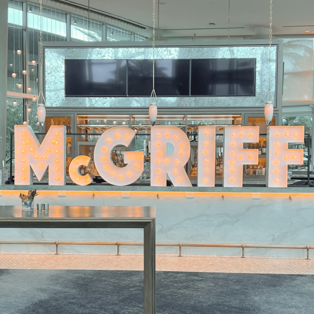 Light-Up Marquee Letters spelling out MCGRIFF at a corporate event