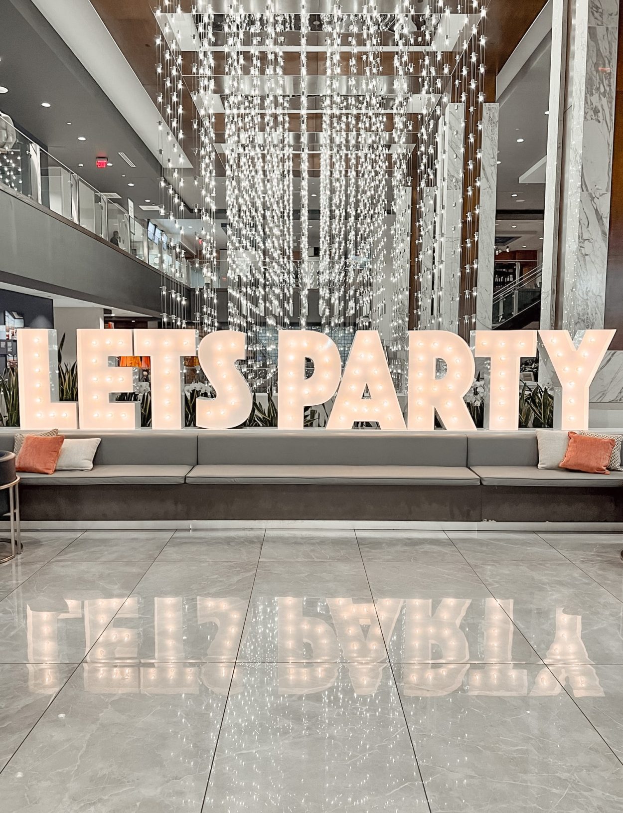 Marquee Letters dpelling out the phrase "Lets Party"